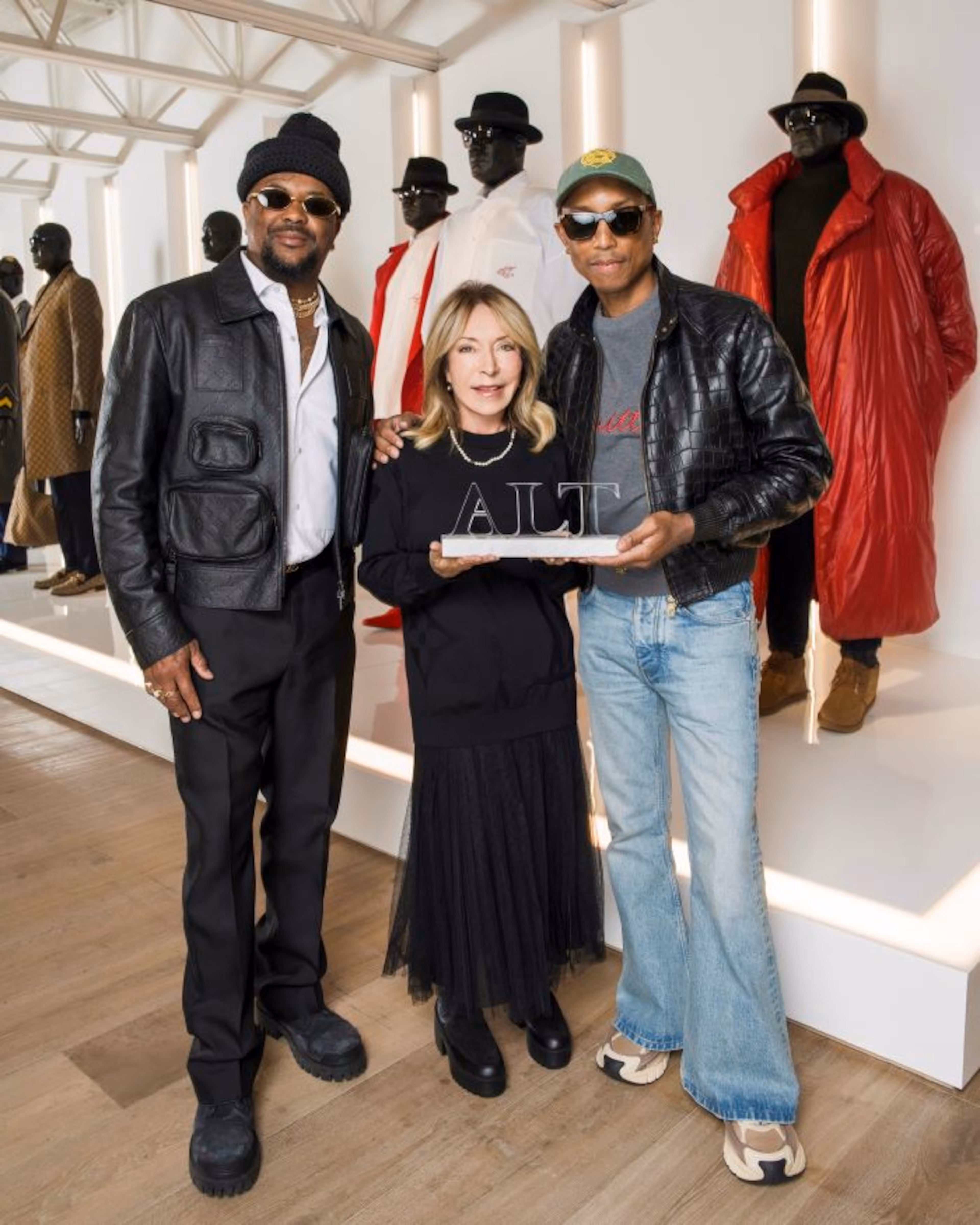 (Left to right) The-Dream, SCAD founder and president Paula Wallace and Pharrell Williams pose with the Andre Leon Talley Lifetime Achievement Award at the "Andre Leon Talley: Style is Forever" exhibition. (Courtesy of SCAD Atlanta)