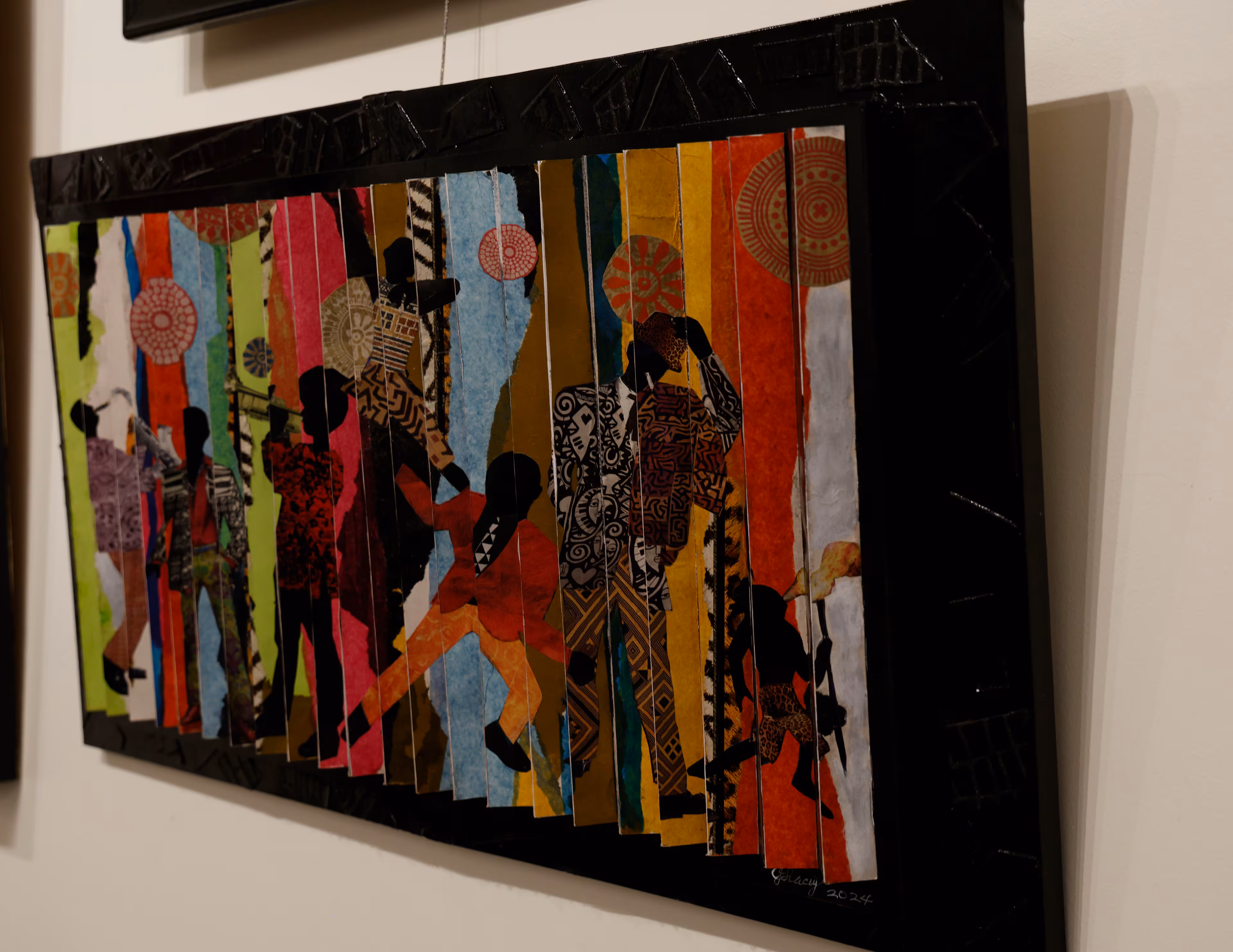 “Genesis to Revelations,” is one of two views of an artistic art expression called an agamorgraph, an art form that seems employ motion, is a part of opening reception of artist J. Stacey Grayson art exhibition at the Fulton County Central Library. Saturday, November 8, 2025. (Akili-Casundria Ramsess, EyeAkili Media for the AJC)