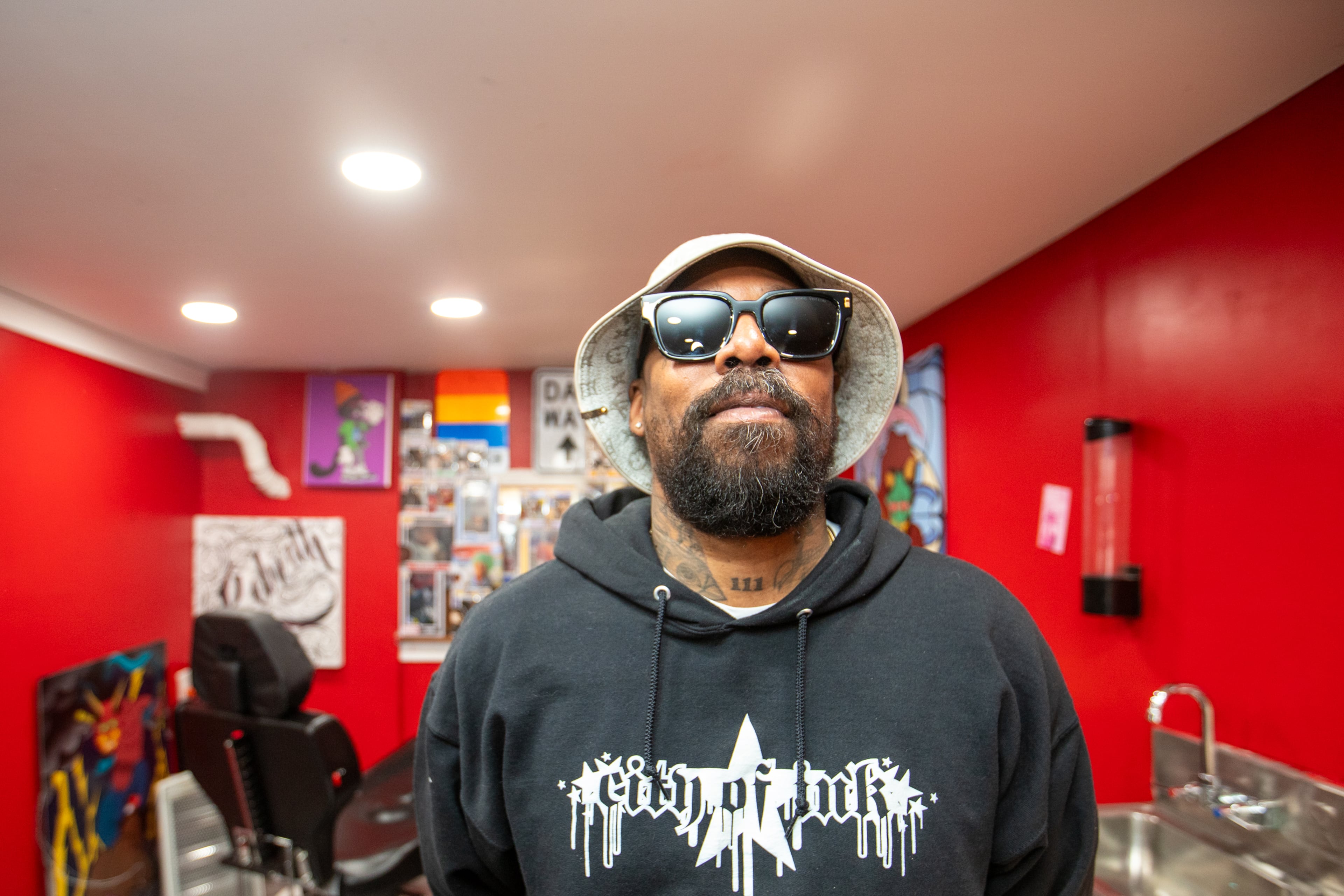 Miya Bailey, founder of City of Ink, said the fight to keep his business open is about more than tattoos. “If Atlanta really values its art community, now’s the time to prove it,” he says. (Jenni Girtman for the AJC 2024)