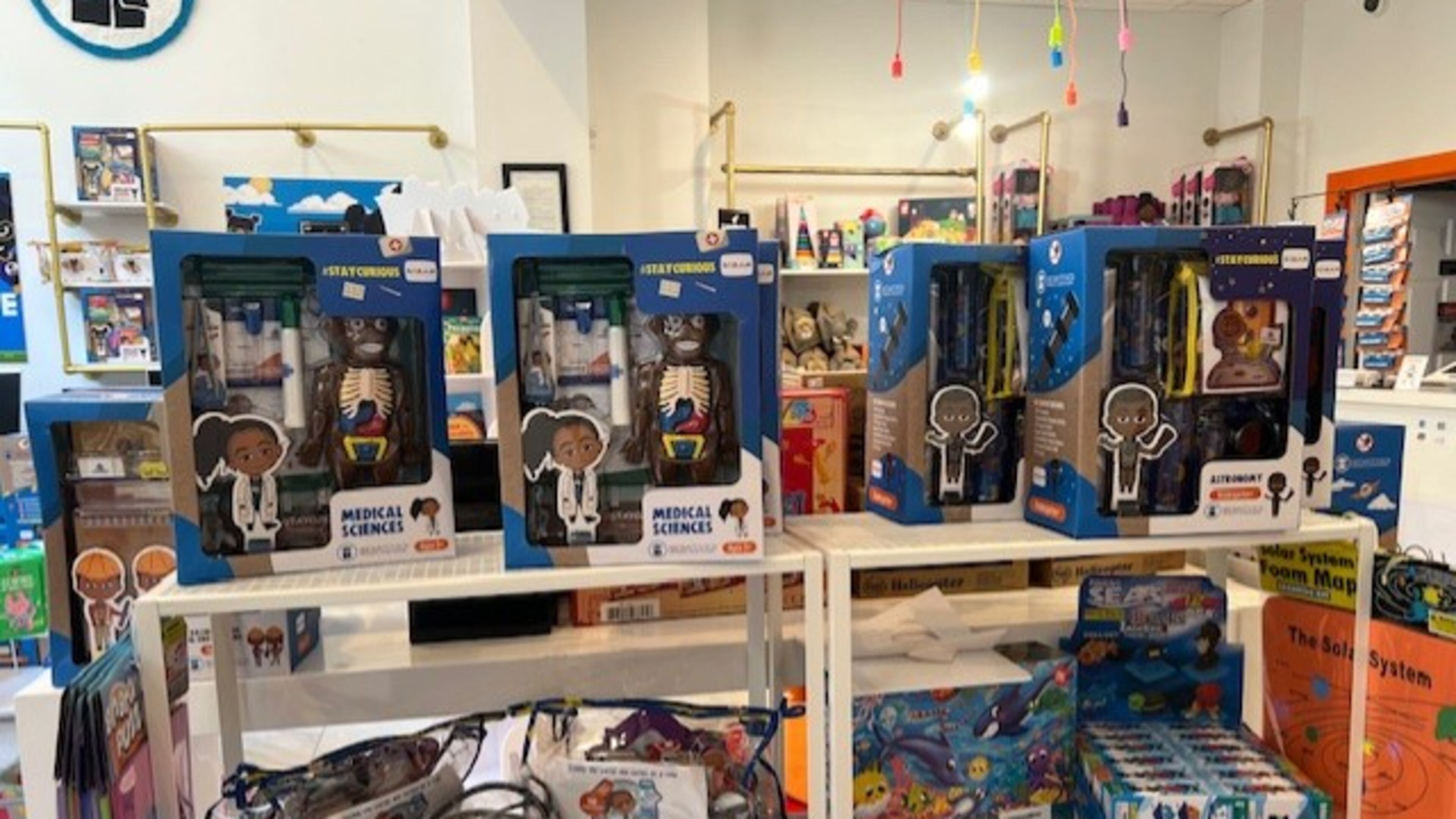 Brown Toy Box specializes in puzzles, science kits, dolls, books, arts and crafts, and other playtime tools meant to inspire young, innovative Black minds. (Courtesy of Brown Toy Box)