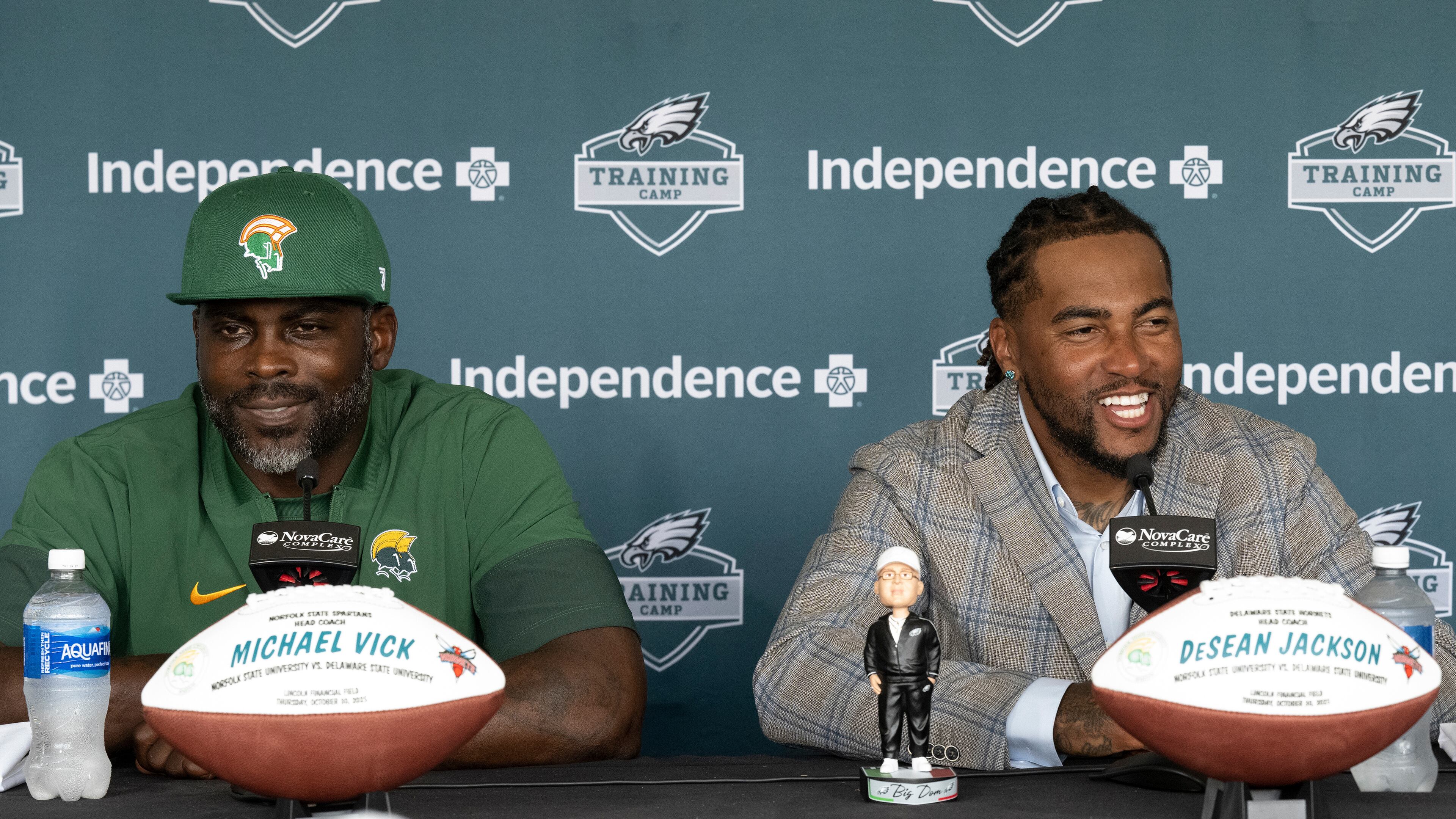 Former Philadelphia Eagles stars Michael Vick, left, and DeSean Jackson address the media at the Eagles' NFL football training camp Tuesday, Aug. 12, 2025, in Philadelphia. (Jose F. Moreno/The Philadelphia Inquirer via AP, file)
