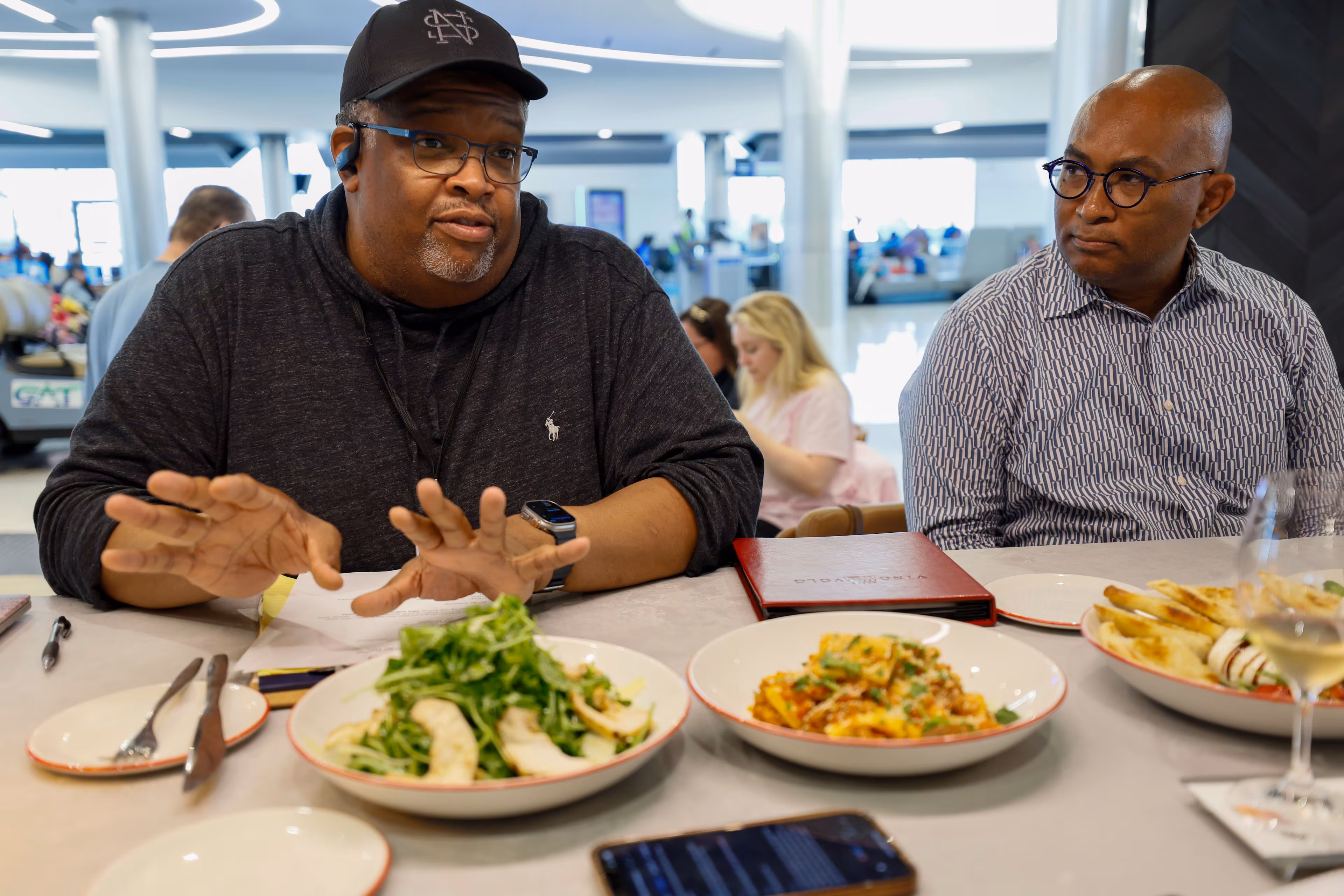Chefs Duane Nutter (left) and Reginald Washington said they originally found better deals on restaurant space in Alabama and waited until summer 2023 to return to Atlanta, when terms were more favorable for the Black chefs. (Miguel Martinez/AJC 2024)