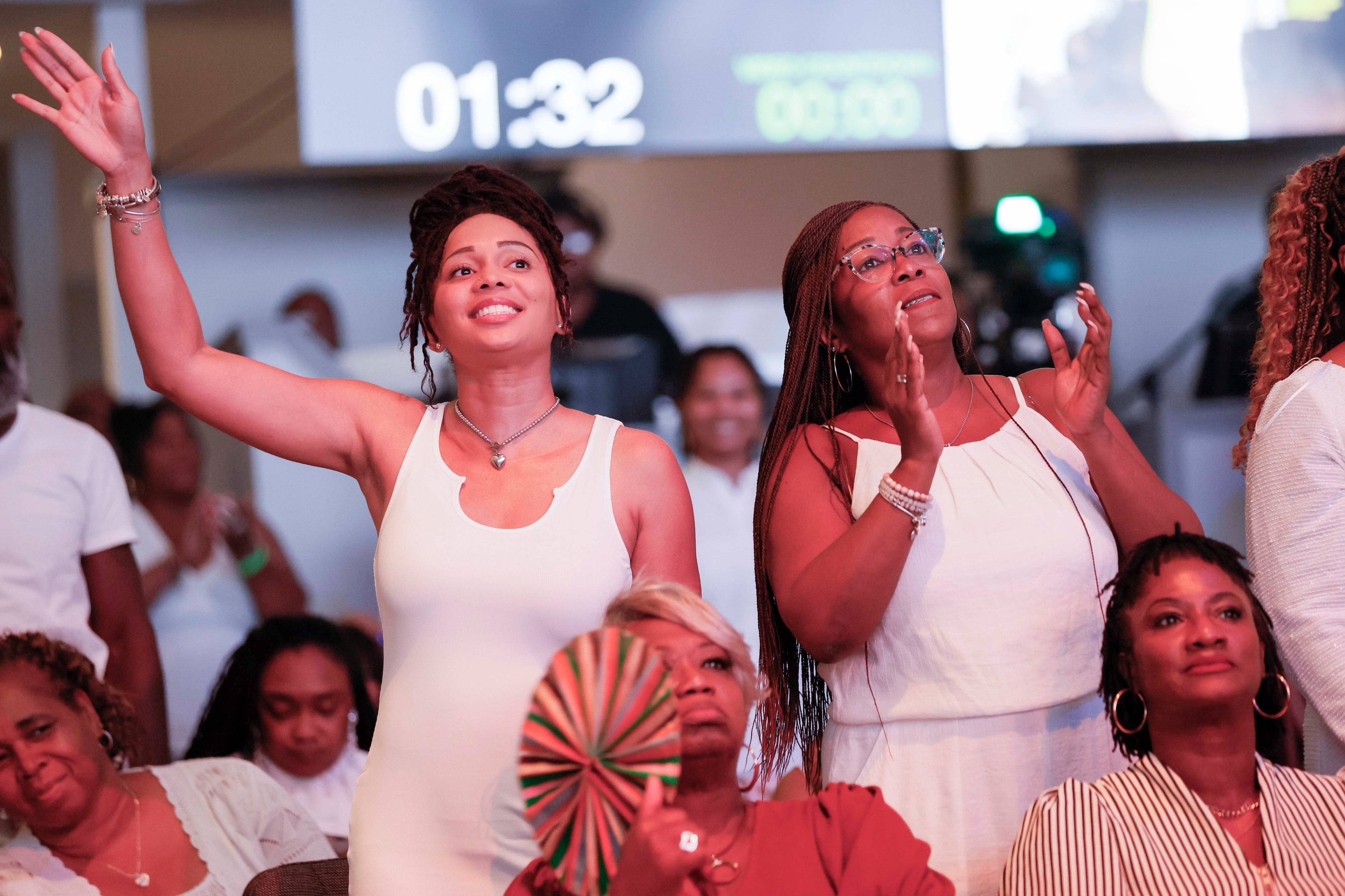 Parishioners sing along with the choir during the 30th pastoral anniversary of Bishop Craig Oliver Sr. at Elizabeth Baptist Church on Sunday, June 8, 2025. (Miguel Martinez/AJC)