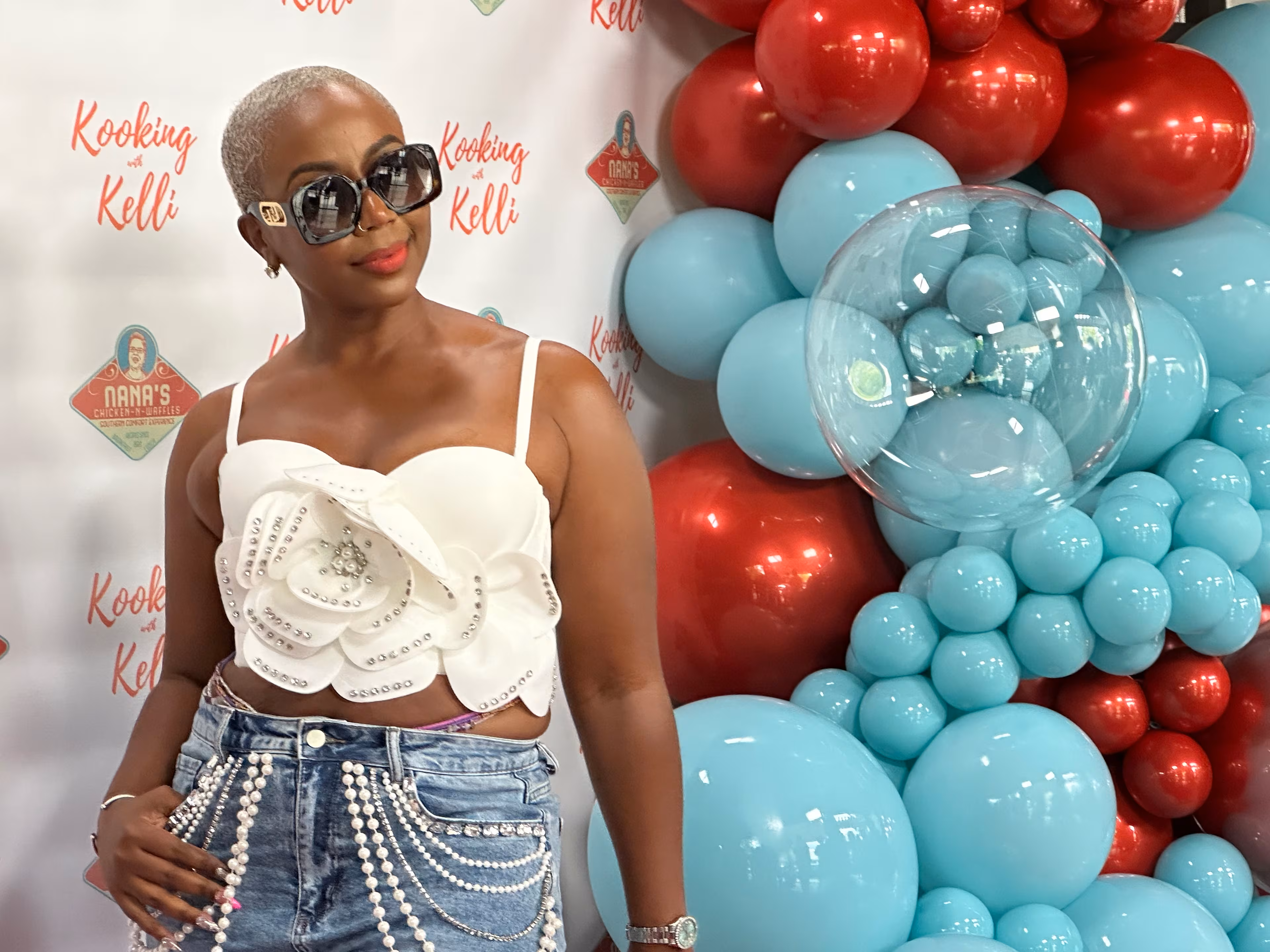 Pinky Cole recently attended a Kelli Ferrell event celebrating the opening of Ferrell's newest Nana's Chicken-N-Waffles restaurant. (Rodney Ho/AJC)