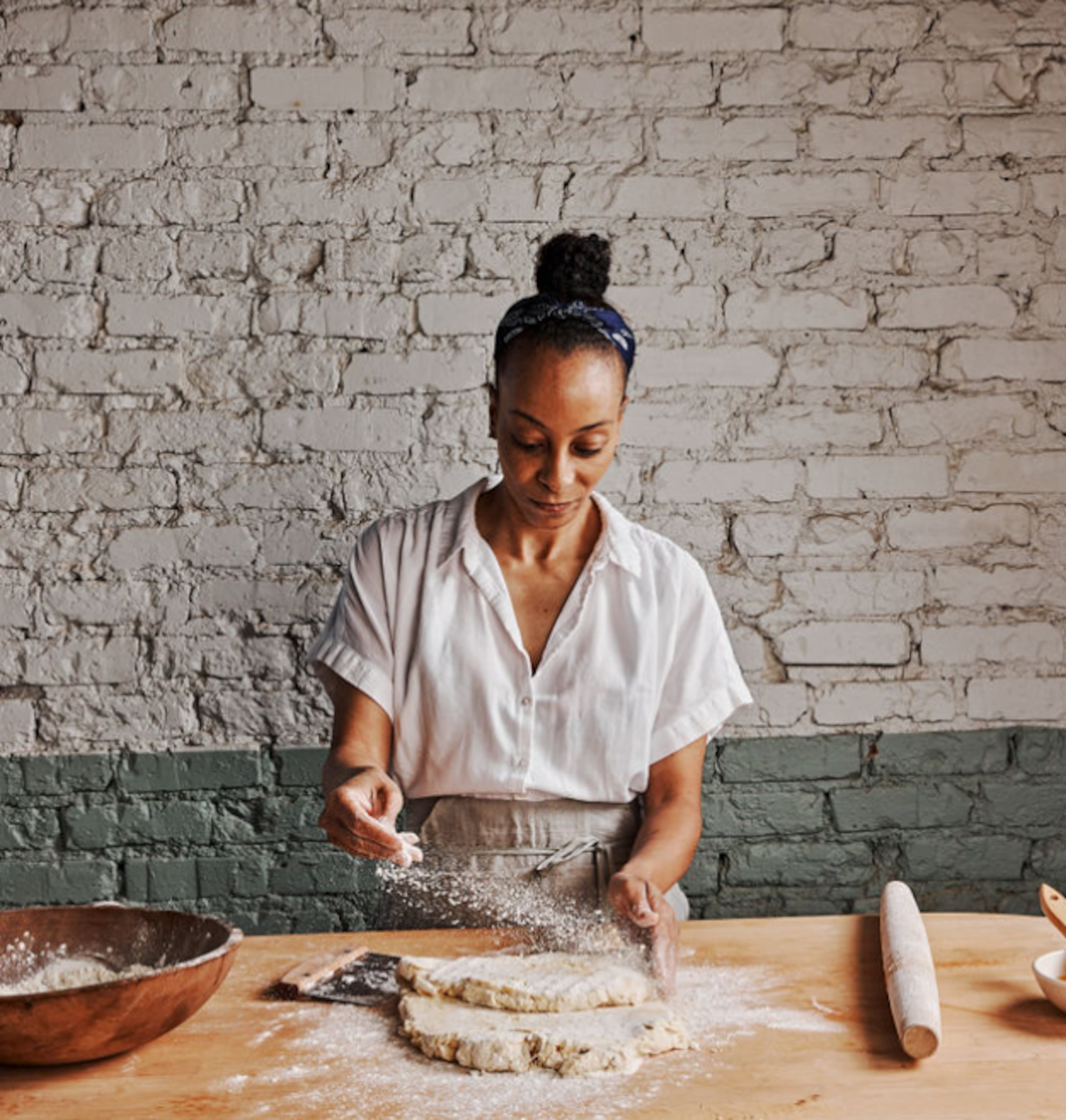 Erika Council prepares one of her signature biscuit recipes. “I’m excited about it. I feel like all things happen for a reason and when God has a plan for you, nothing can get in the way of that,” Council said of the move in an exclusive interview with UATL. (Courtesy of Andrew Thomas Lee)