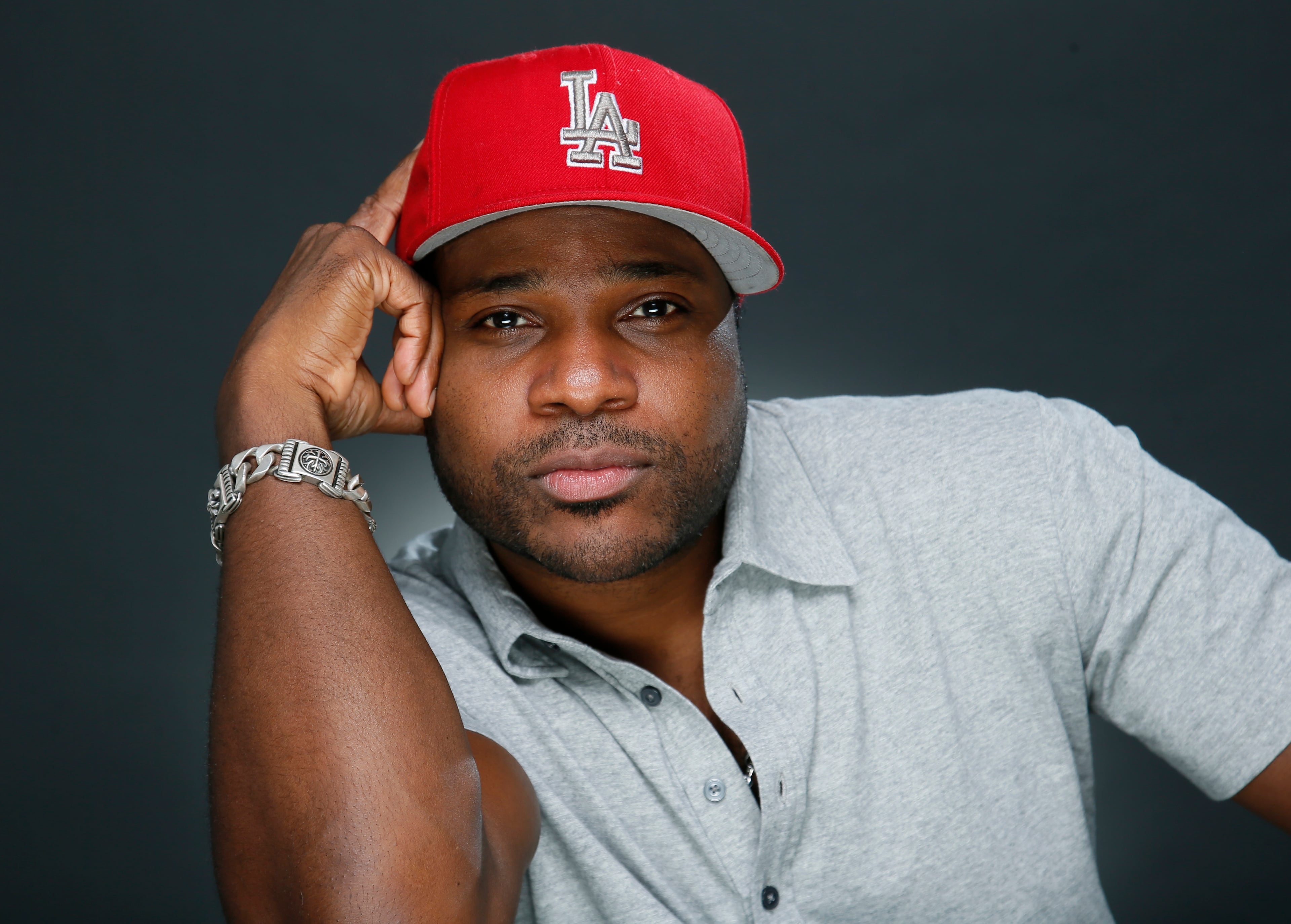 Actor and musician Malcolm-Jamal Warner is best known for playing Theo on "The Cosby Show." (Danny Moloshok/AP 2015)