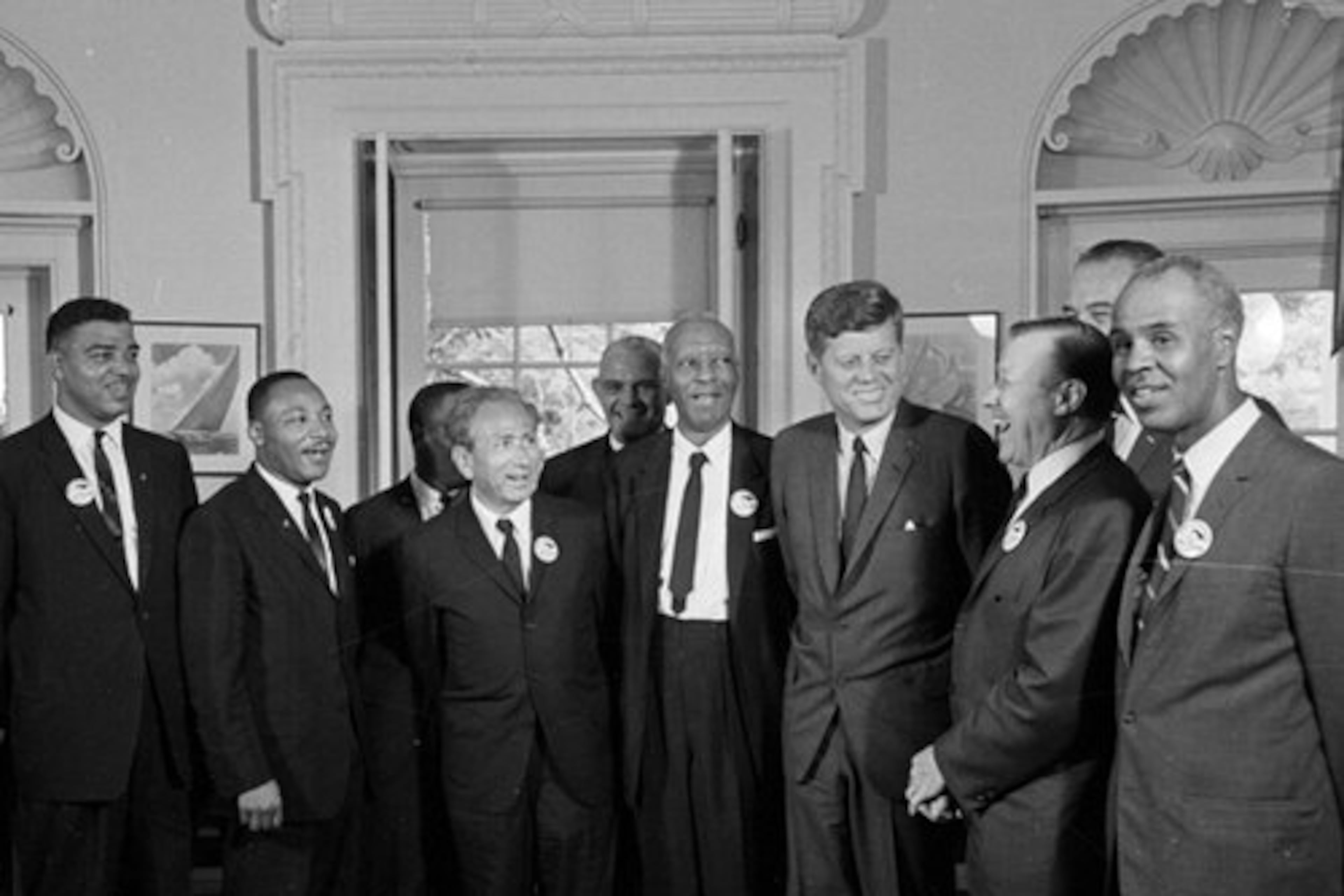 1963: President Kennedy poses at the White House with a group of leaders of the March on Washington. (From left) Whitney Young, Dr. Martin Luther King Jr., John Lewis, Rabbi Joachim Prinz, Dr. Eugene P. Donnelly, A. Philip Randolph, Kennedy; Walter Reuther, Vice-President Johnson (rear), and Roy Wilkins. (AP)