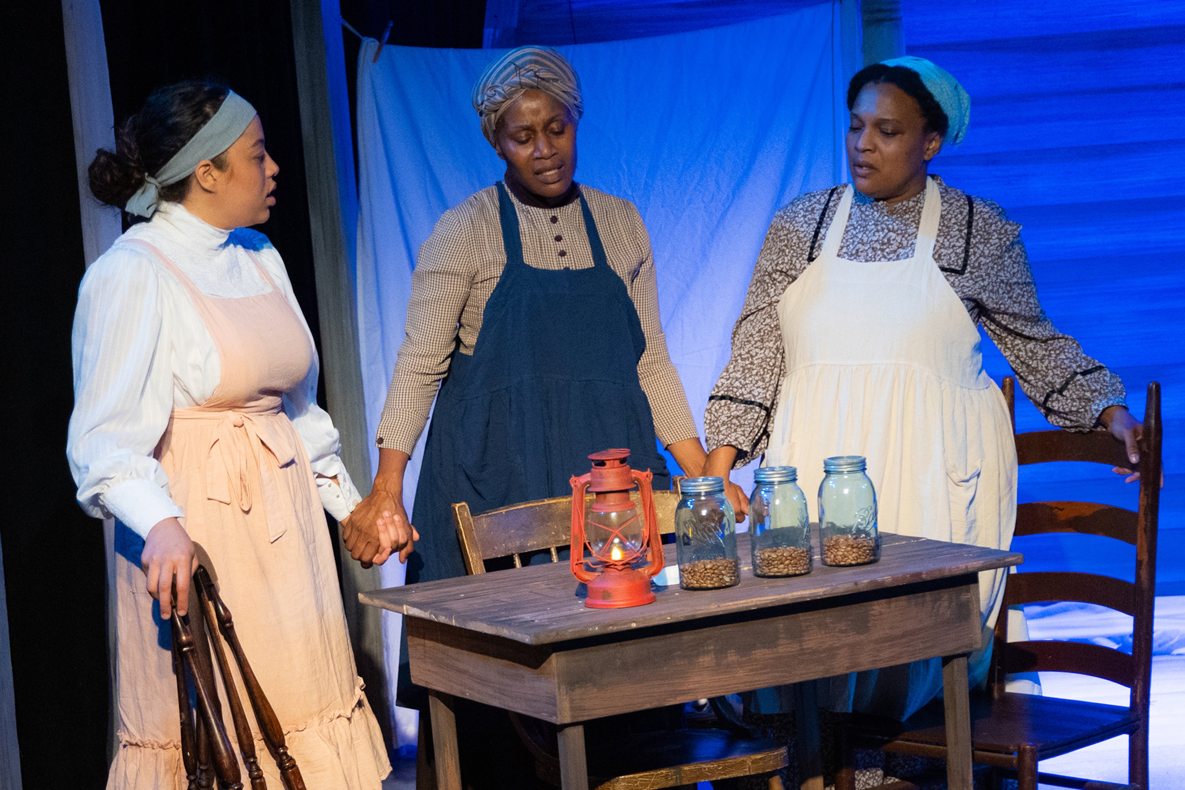 Kenedi Deal, Nevaina and Tanya Freeman star in “The Wash,” which is playing at both Synchronicity Theatre and Impact Theatre this summer. (Courtesy of Casey Gardner Ford)