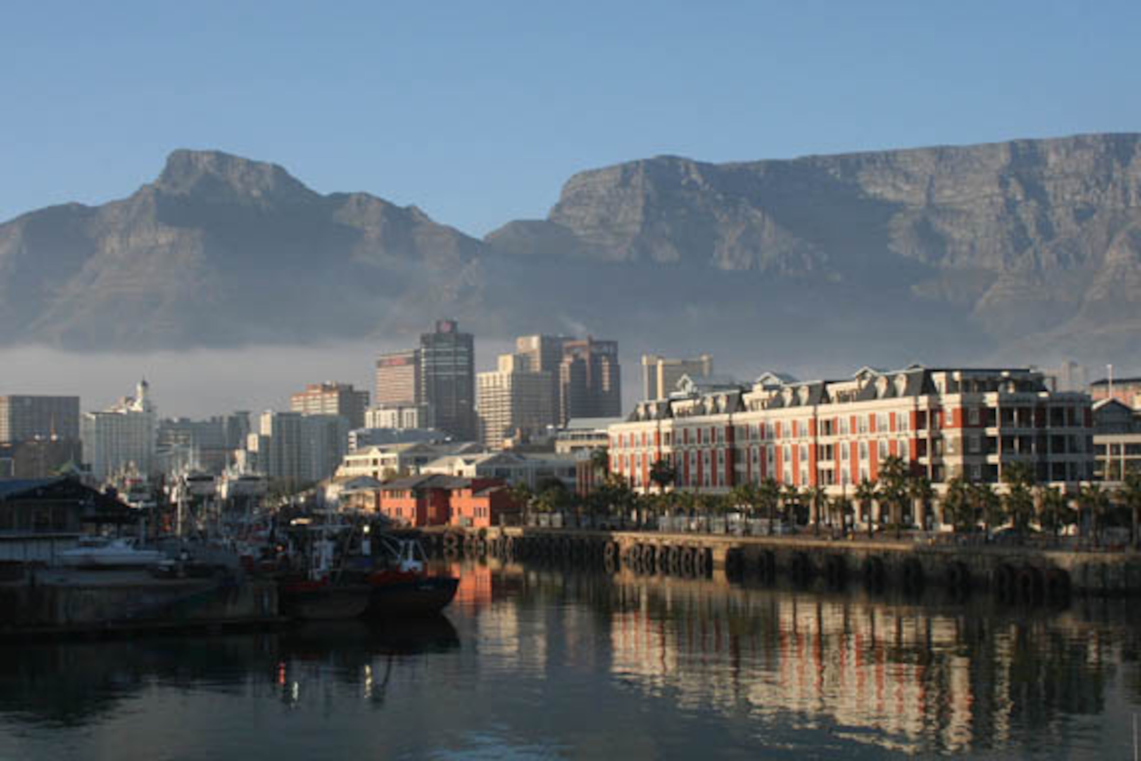 The stunning architecture of Cape Town, South Africa, with the Victoria and Alfred Waterfront as its centerpiece, is a sun-drenched working harbor that basks underneath Table Mountain. Natural wonders, culinary marvels and myriad cultures combine to make Cape Town a world-class vacation destination. (Mary Ann Anderson/McClatchy News Service)