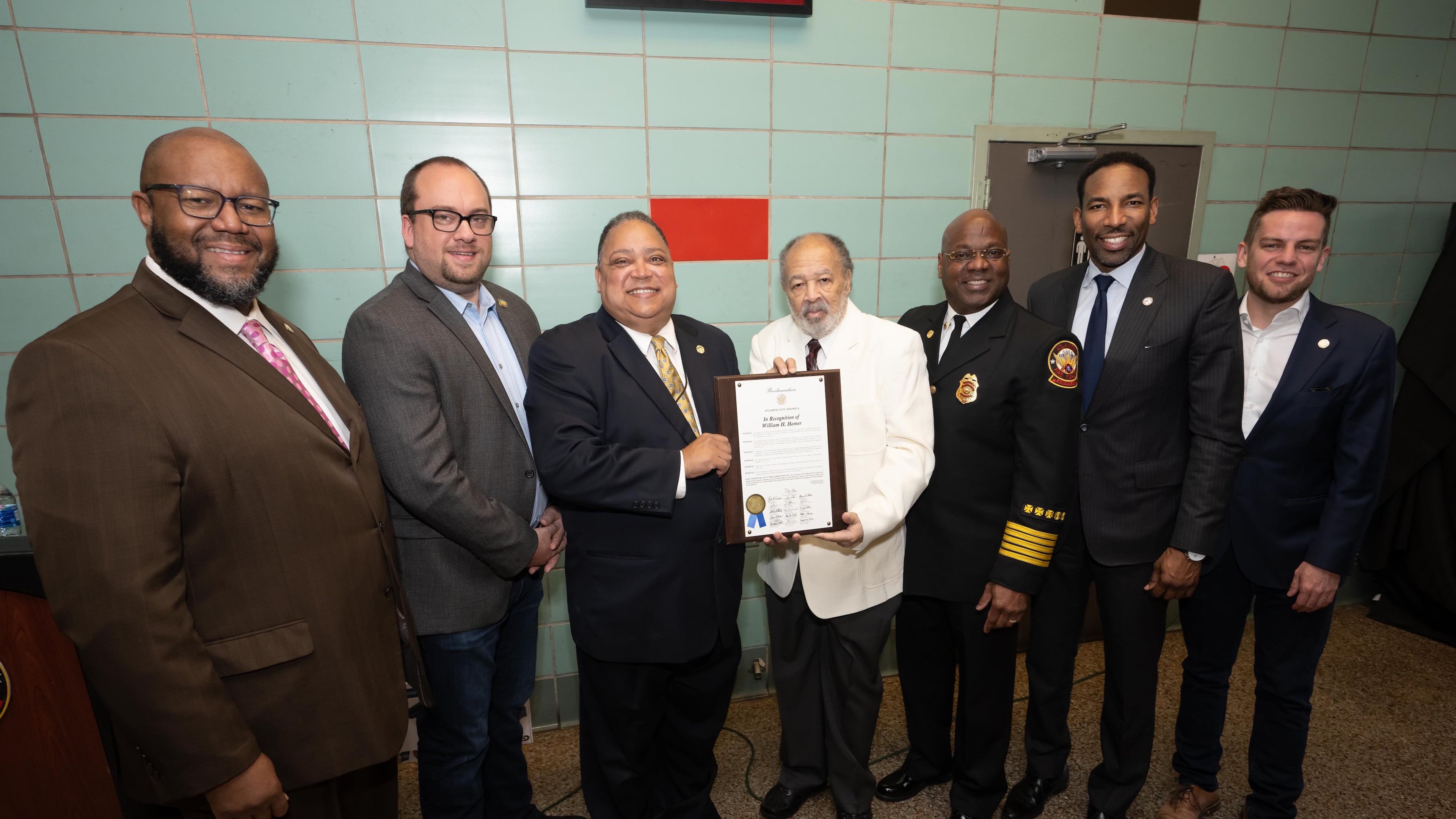 William H. Hamer (center) poses with Mayor Andre Dickens, Atlanta Fire & Rescue Chief Roderick M. Smith and members of the Atlanta City Council. In 2023, the council declared April 3 as “William H. Hamer Day” to honor his steadfast leadership and service. (Courtesy of the city of Atlanta)