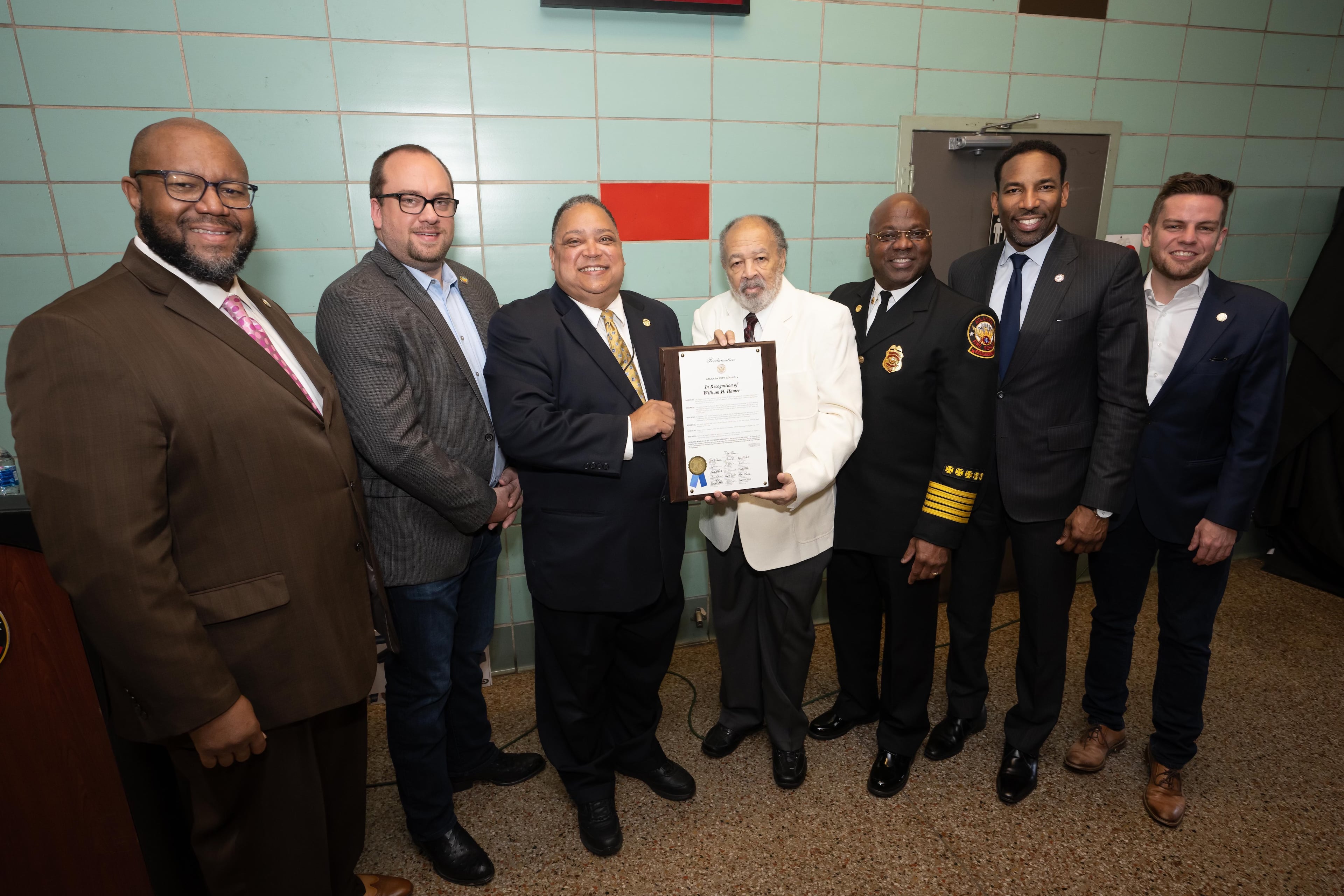 William H. Hamer (center) poses with Mayor Andre Dickens, Atlanta Fire & Rescue Chief Roderick M. Smith and members of the Atlanta City Council. In 2023, the council declared April 3 as “William H. Hamer Day” to honor his steadfast leadership and service. (Courtesy of the city of Atlanta)