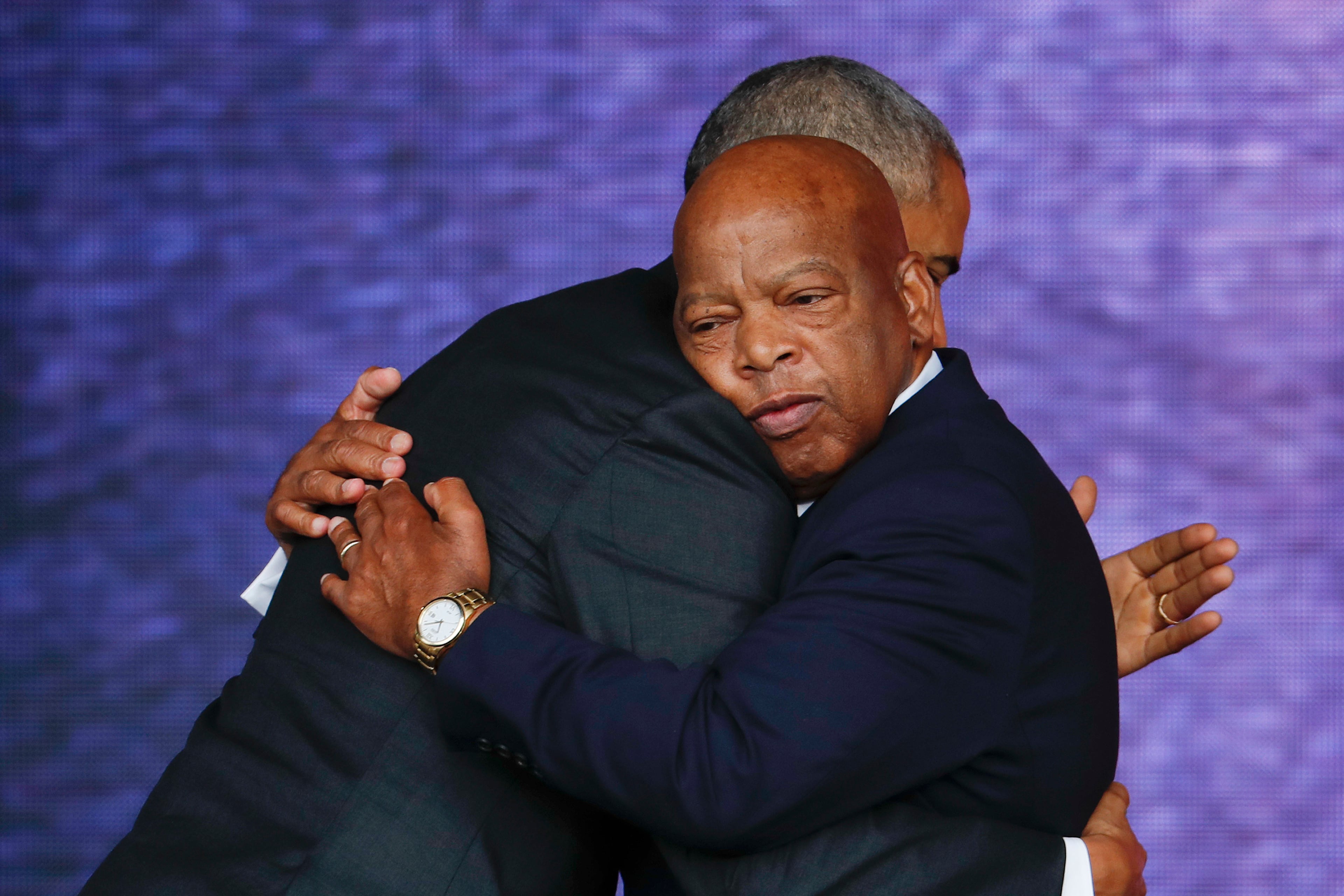 Rep. John Lewis, right, and President Barack Obama embrace at the dedication ceremony for the Smithsonian Museum of African American History and Culture on the National Mall in Washington on Sept. 24, 2016. (Pablo Martinez Monsivais/AP)