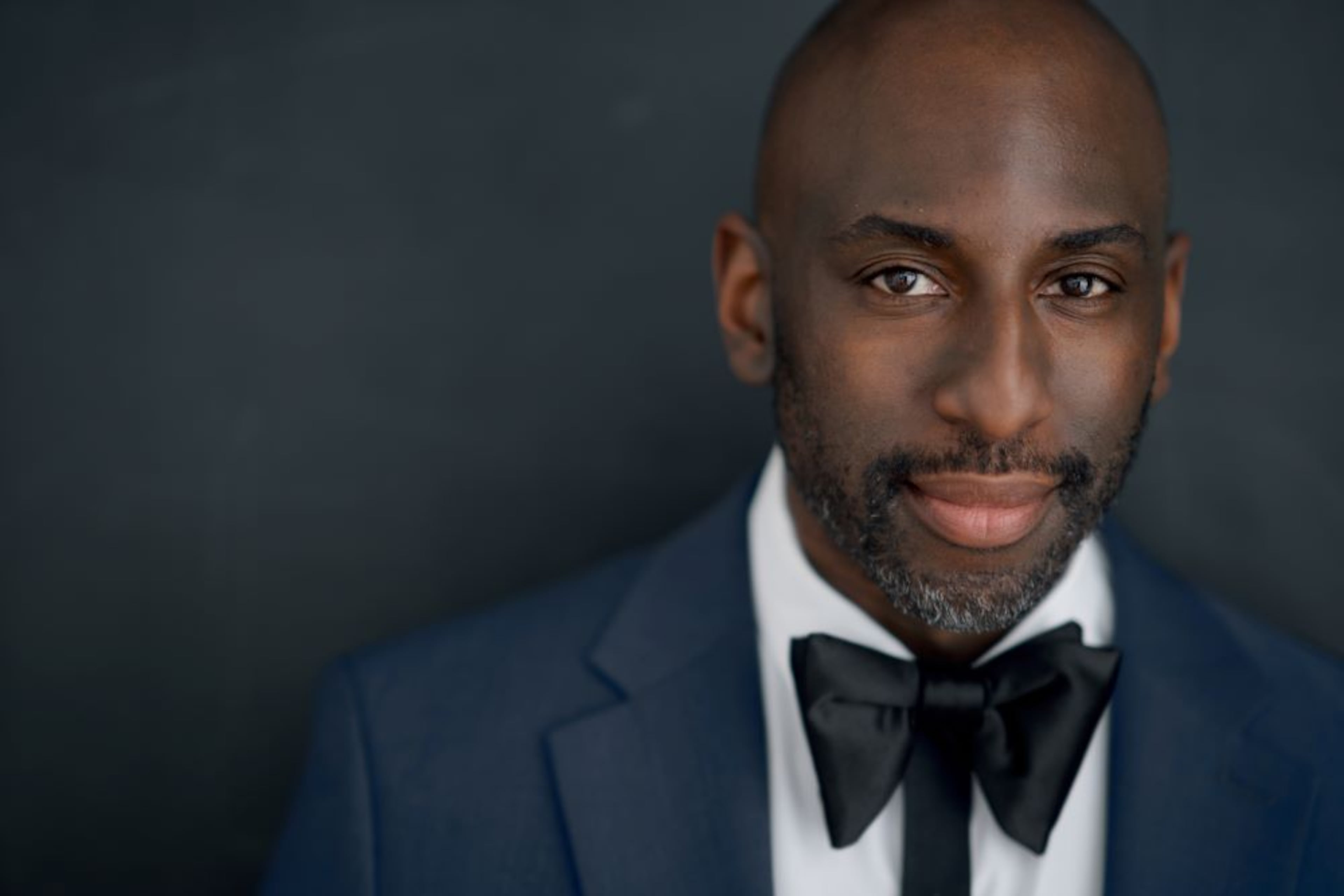 Rashad Chambers graduated from Morehouse College with a degree in business administration in 2001. He became executive director of New York City Gay Men's Chorus in May 2025.