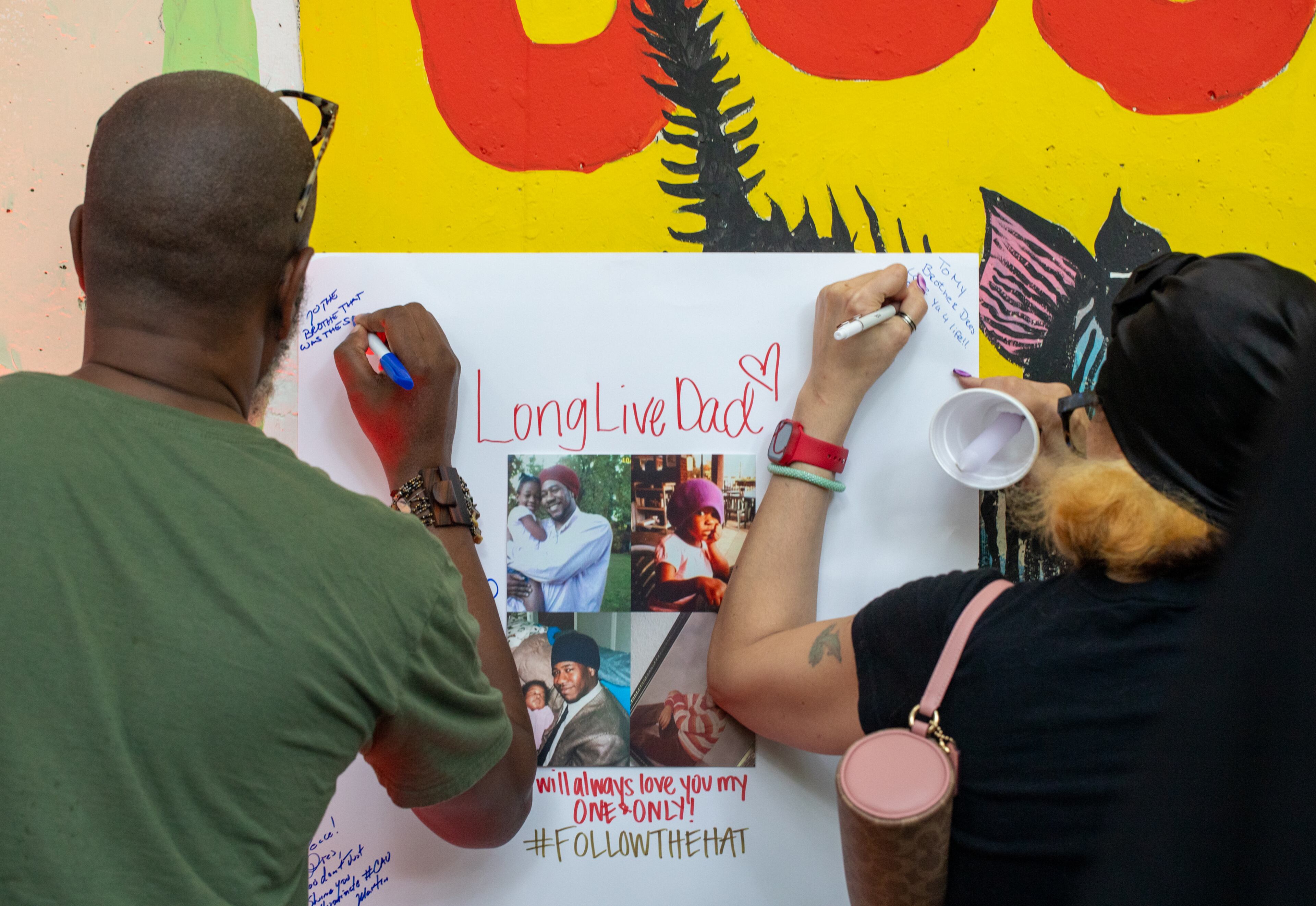 During the vigil for Andre "D.R.E.S. Tha Beatnik" Lett, his daughter asked everyone to leave a message at the remembrance. His family and friends remember a gifted entertainer, someone who was passionate about supporting creatives. (Jenni Girtman for the AJC)