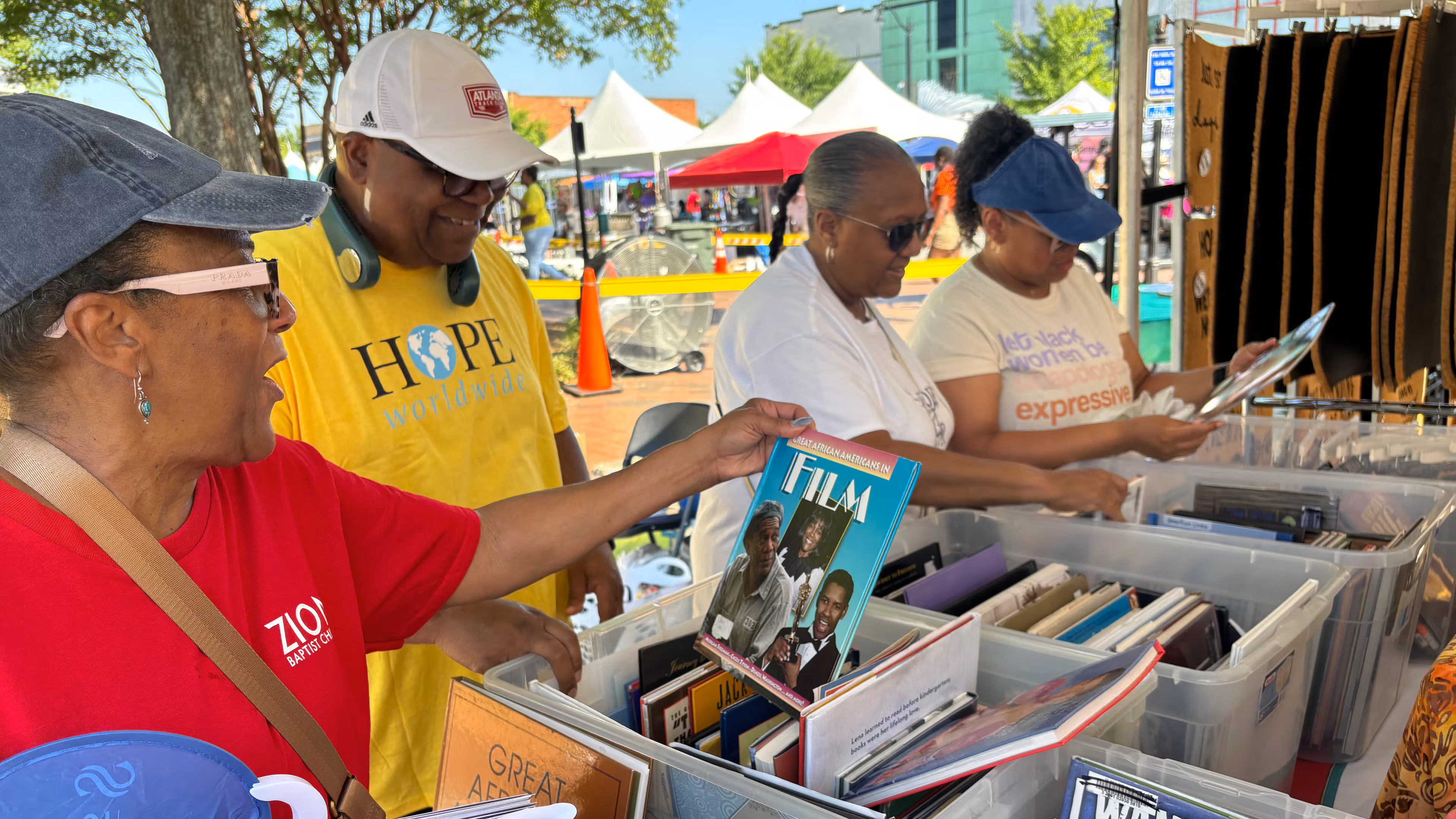 North River Church Hope Worldwide gave away 2,000 books on Black history in 2024 during a Juneteenth celebration in Marietta Square. The books were donated by Books For Africa in Marietta. (Courtesy of North River Hope Worldwide 2024)