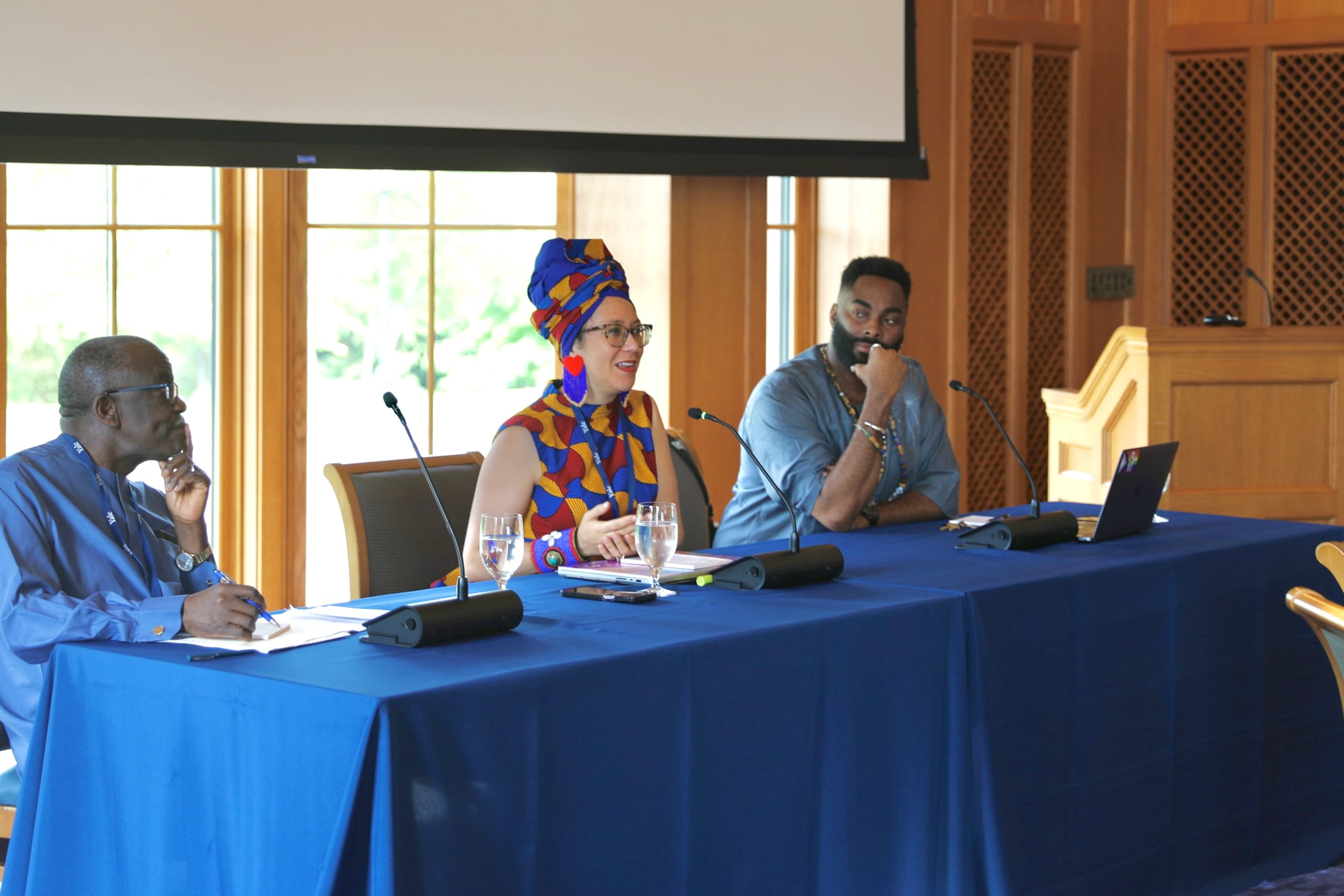 From L-R: Keynote speakers Dr. Jacob K. Olupona (Harvard University) and Manbo Dr. Kyrah Malika Daniels (Emory University) and event organizer Houngan Collin Édouard (Yale University). (Courtesy of Amanda Patrick/Yale University)