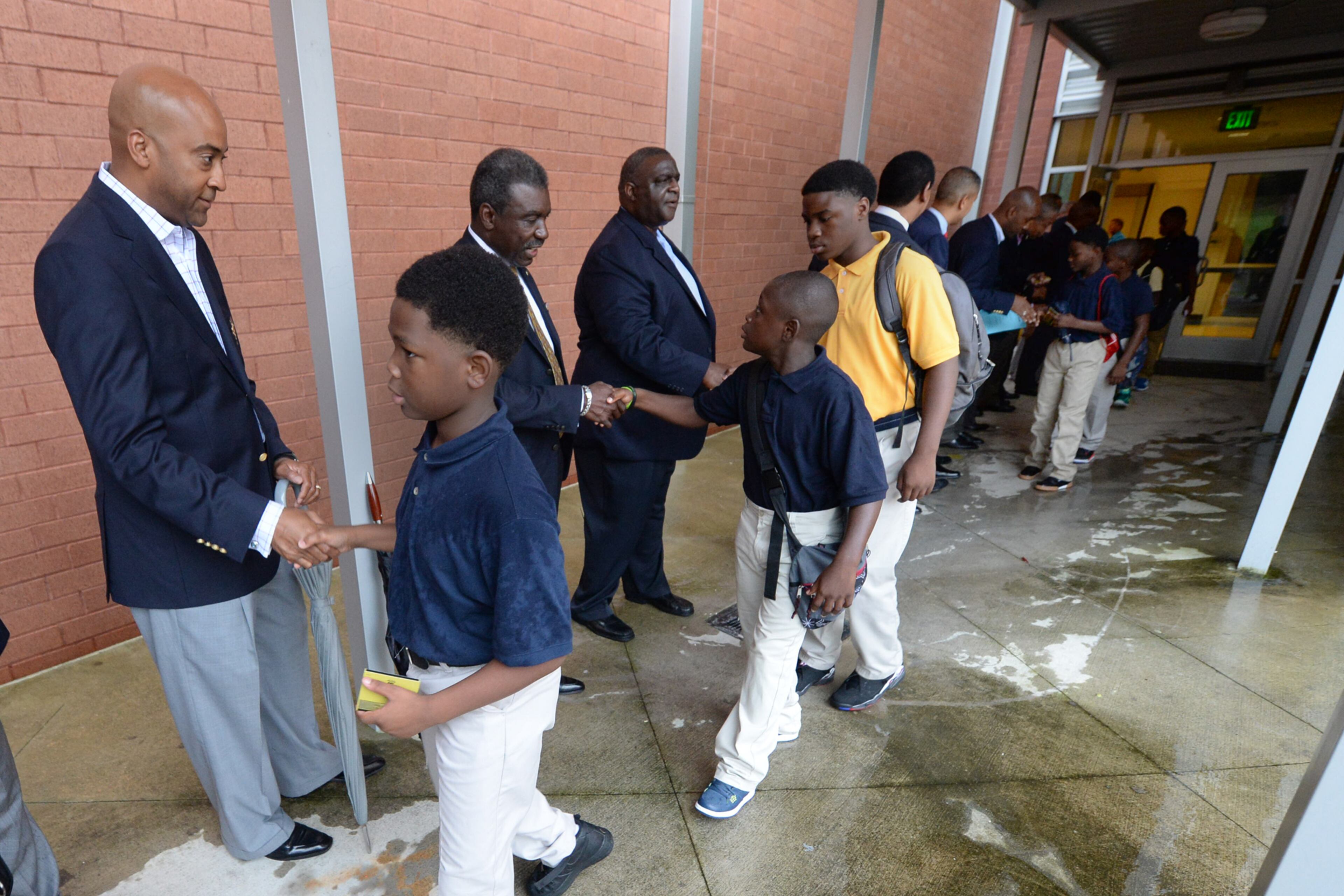 More than 80 members of the 100 Black Men of Atlanta greeted the boys and their parents as they arrived on the first day of school at at B.E.S.T Academy.