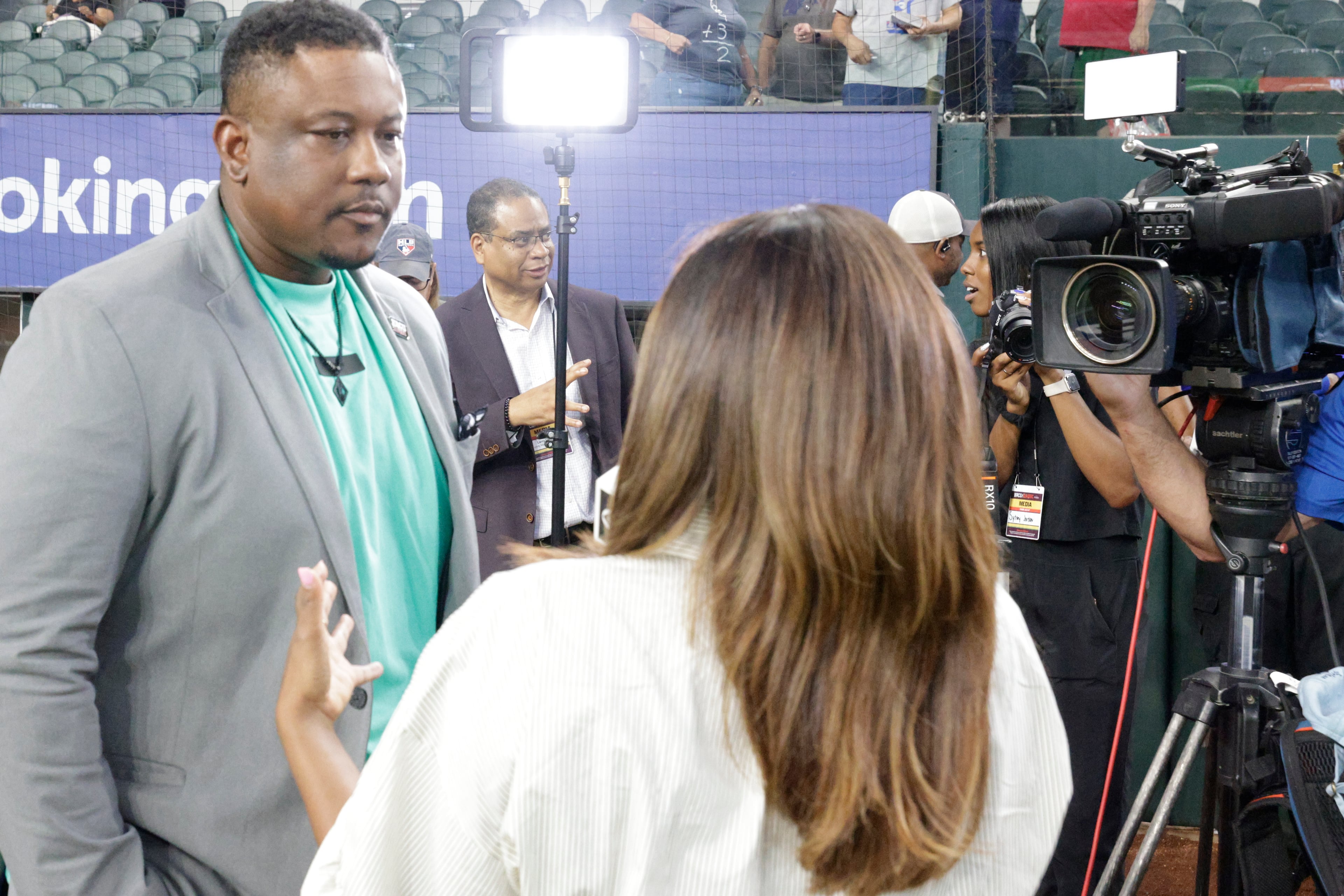 Del Matthews (left), MLB’s senior vice president of baseball development, said the HBCU Swingman Classic gives players from historically Black colleges a chance to shine in front of major league scouts. (Courtesy of Major League Baseball)