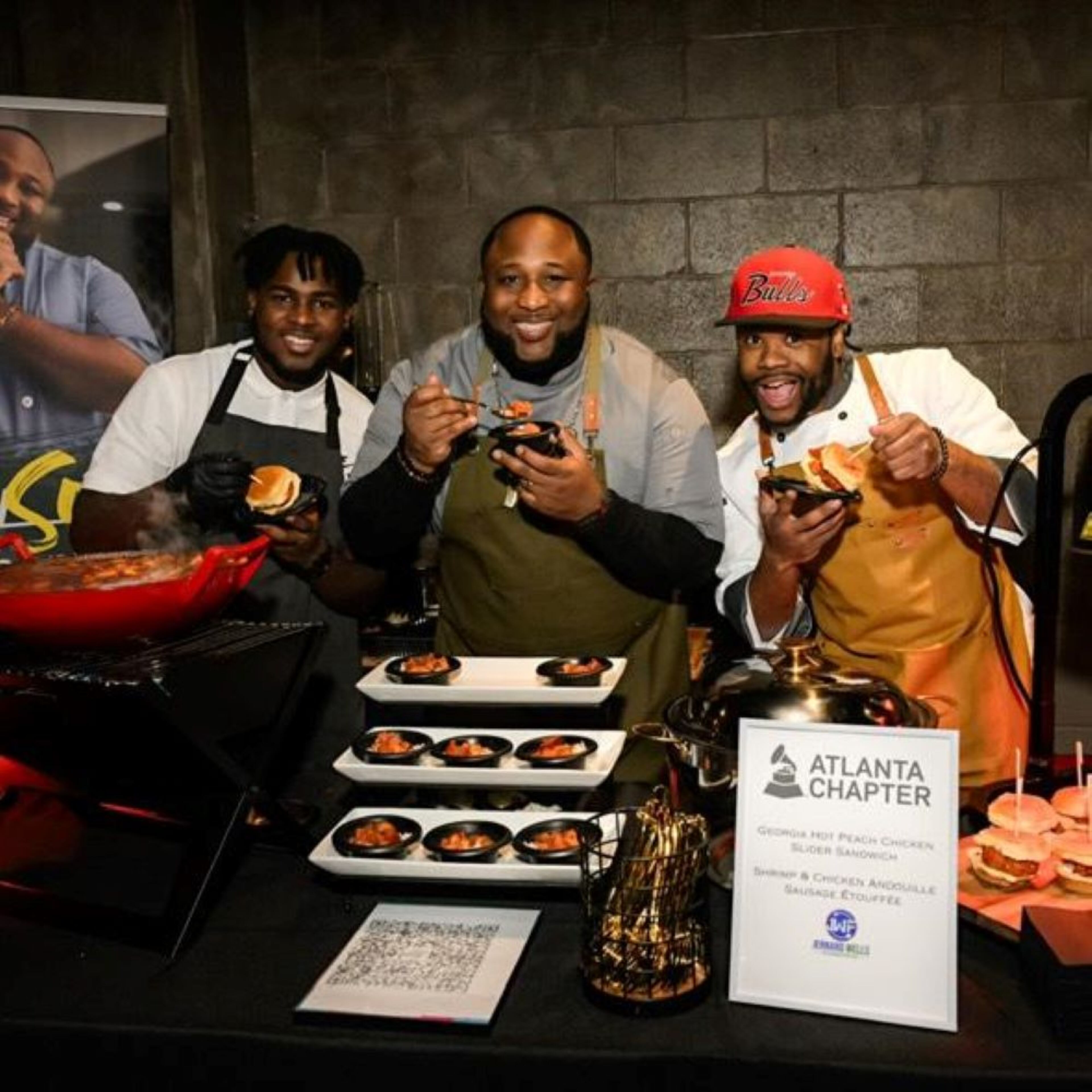 Keenan Wells (left to right), Chef Jernard Wells and Cory "Chef Romance" Hinton host a station at Recording Academy-Atlanta Chapter nomination party on January 25, 2023 at The Loft in Atlanta. (Courtesy Cory "Chef Romance" Hinton)