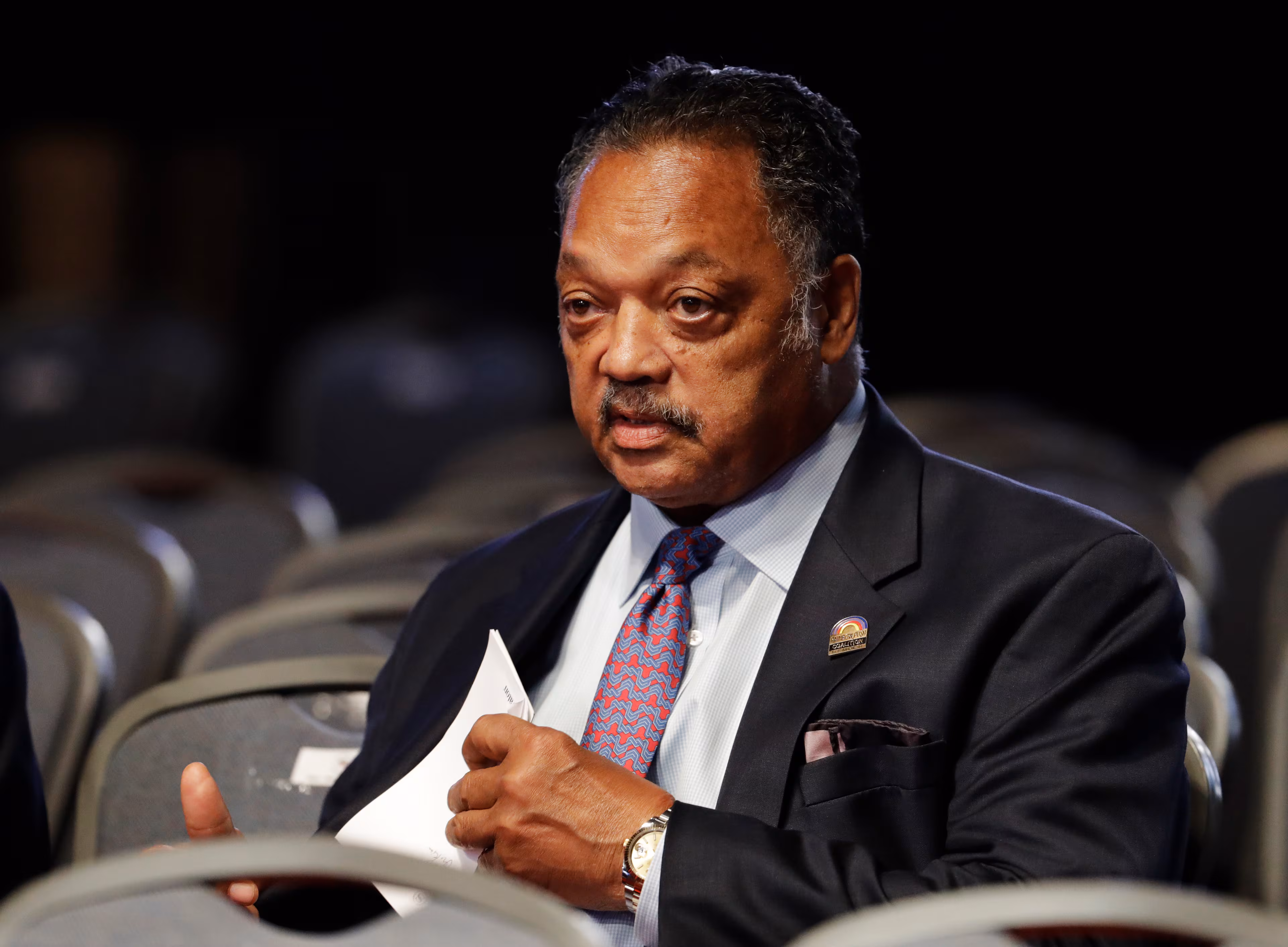 Rev. Jesse Jackson sits in the audience before the presidential debate between Democratic presidential nominee Hillary Clinton and Republican presidential nominee Donald Trump at Hofstra University in Hempstead, N.Y., Monday, Sept. 26, 2016. (Julio Cortez/AP)