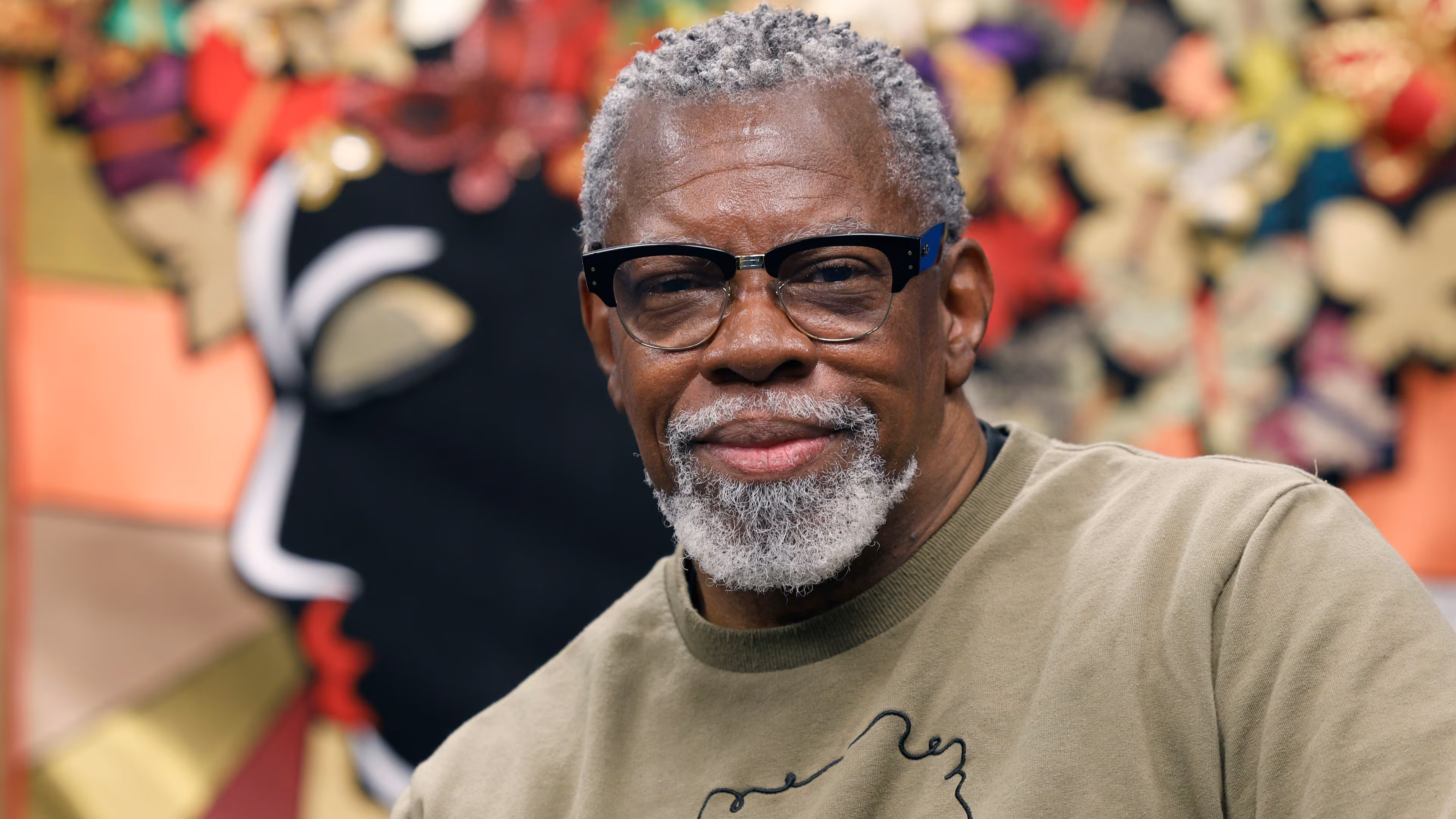 Artist J. Stacey Grayson at the opening of his art exhibition at the Fulton County Central Library. Saturday, November 8, 2025. (Akili-Casundria Ramsess, EyeAkili Media for the AJC)